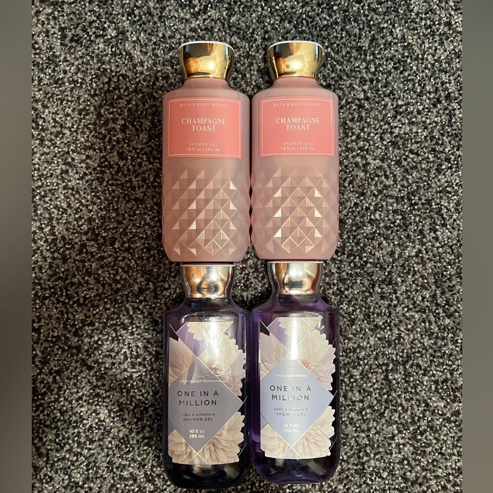 4 bottles of Bath and Body Works shower gel